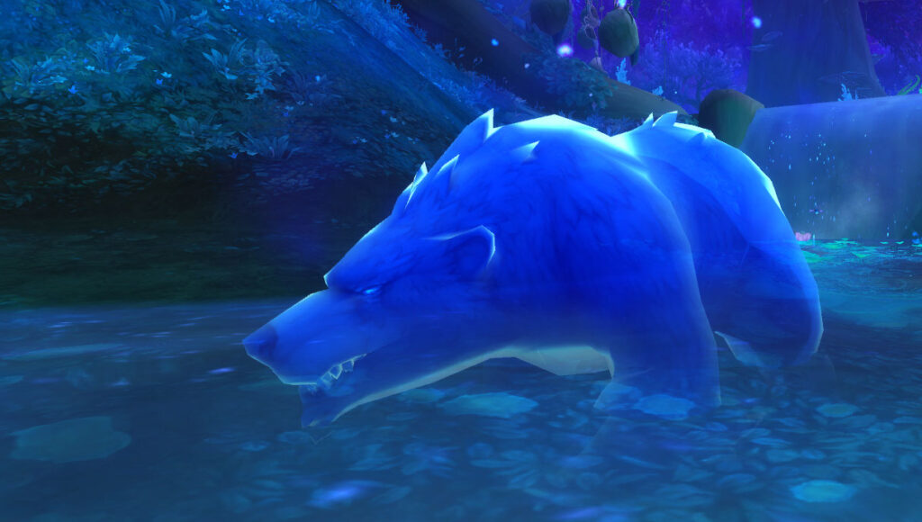 Ringo, as a big blue bear, stands in the stream, fishing.